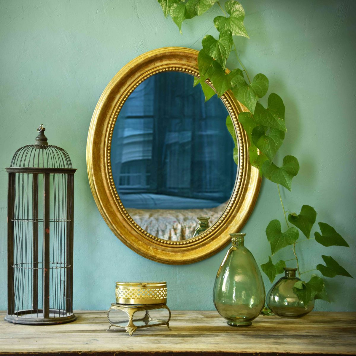Espejo ovalado dorado vintage
