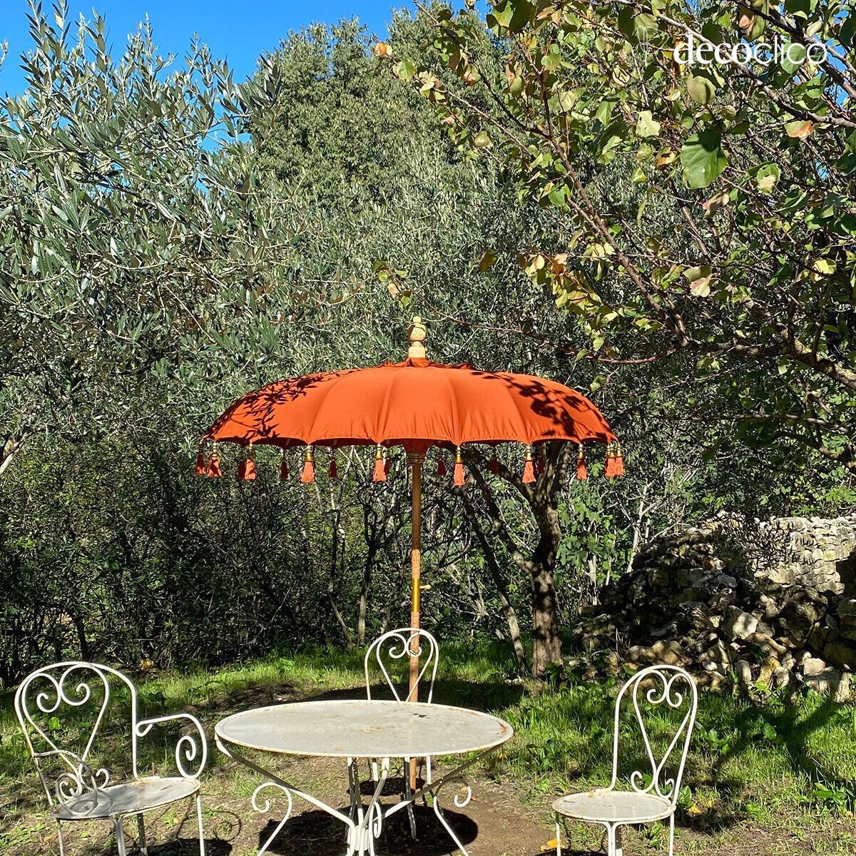 Balinese-style parasol in wood and orange fabric