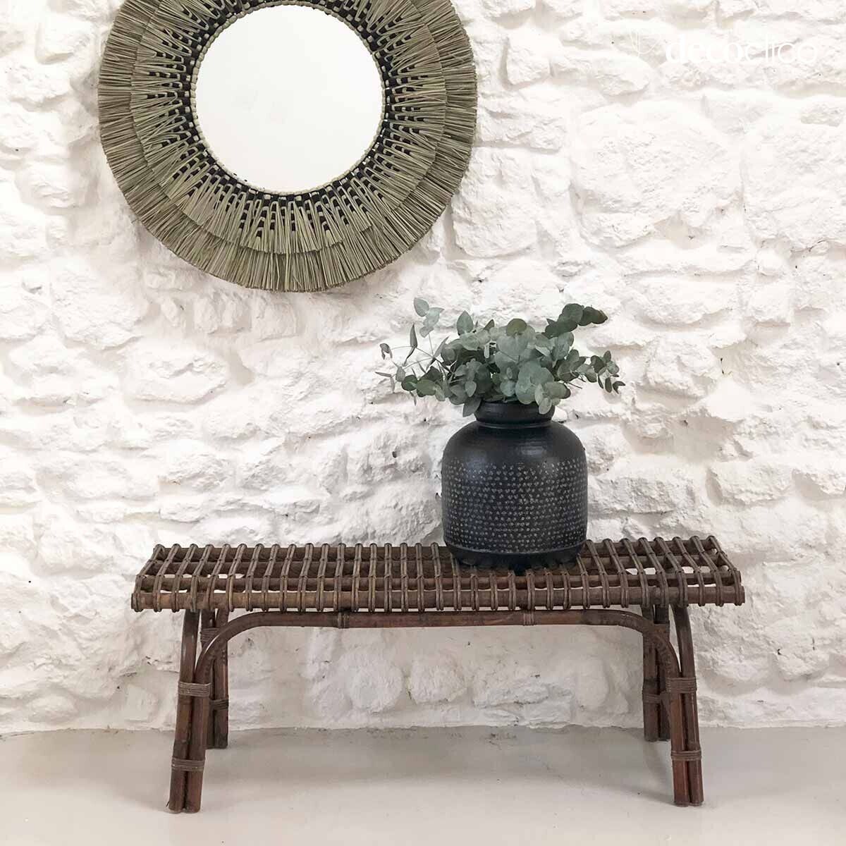 Bench for the end of a bed in woven natural rattan