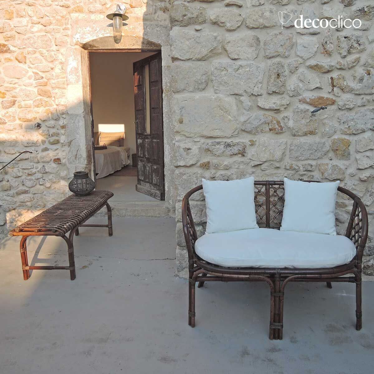 Bench for the end of a bed in woven natural rattan