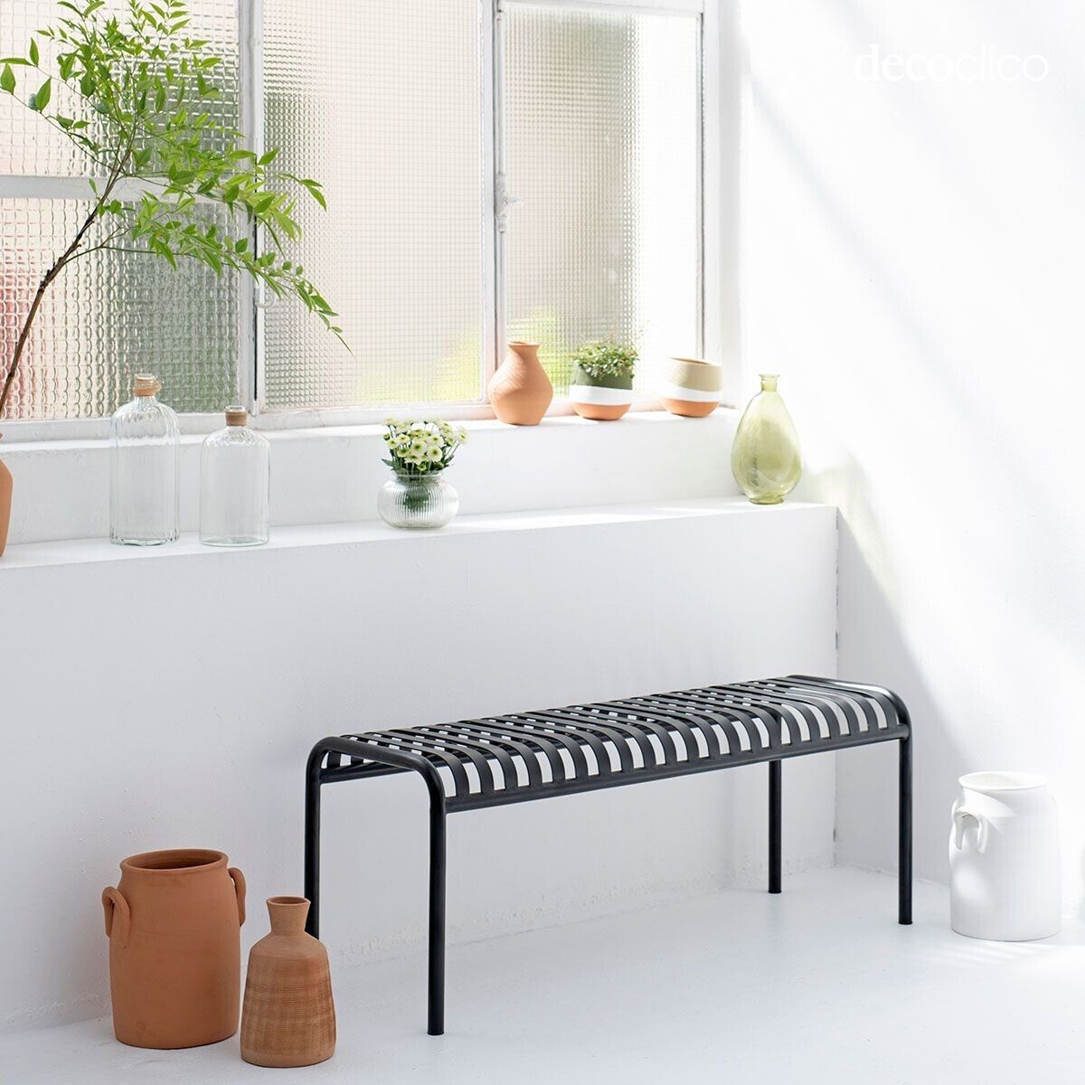 Black wrought iron bench