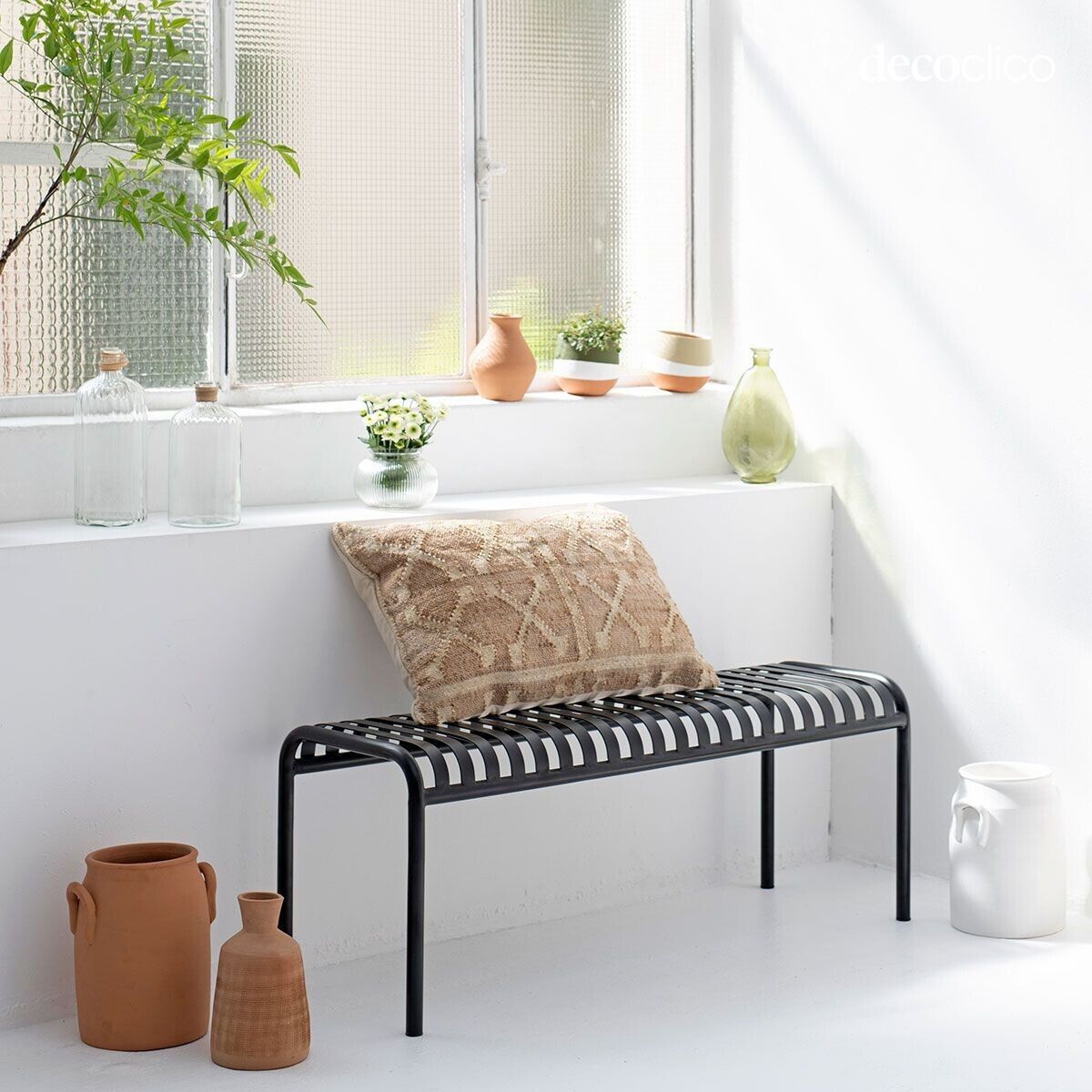 Black wrought iron bench