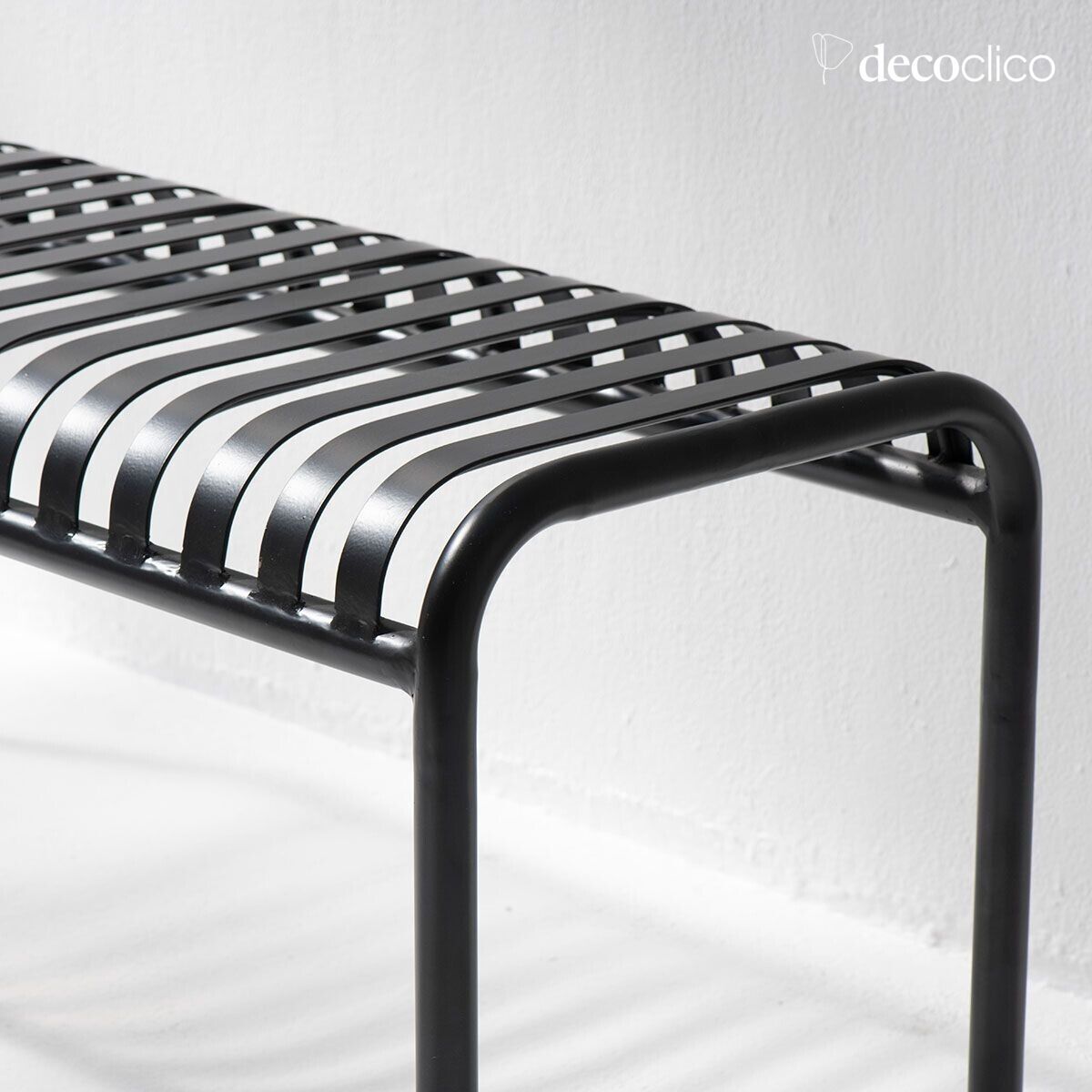 Black wrought iron bench