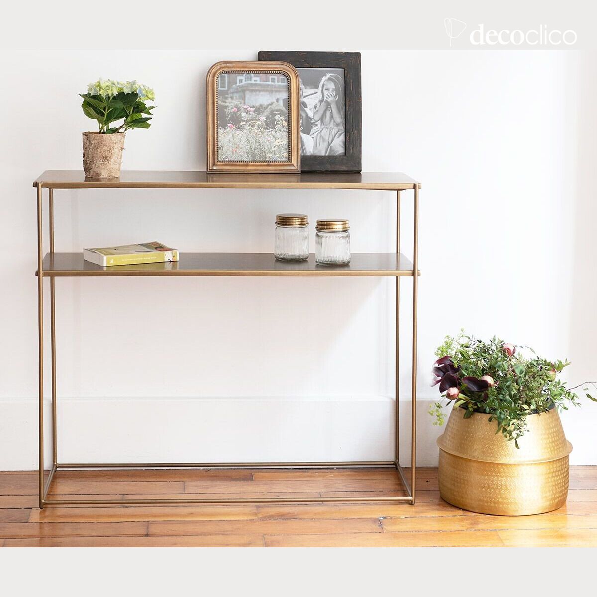 Double-level metal console with brass finish