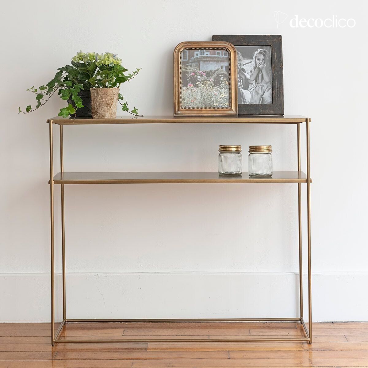 Double-level metal console with brass finish