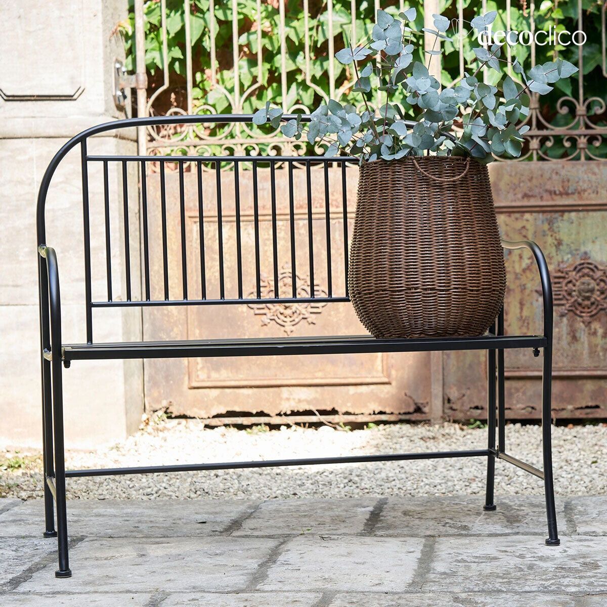 Folding black wrought iron bench with armrests