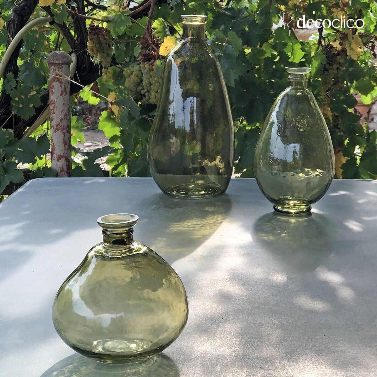 Green dented glass vase with stopper 17 x 15 cm