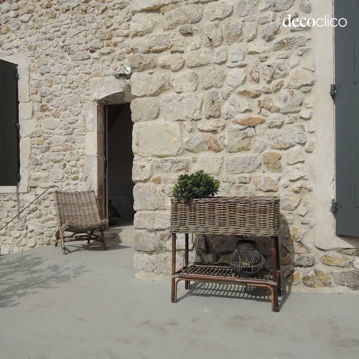 Jardinière sur pied en rotin naturel tressé