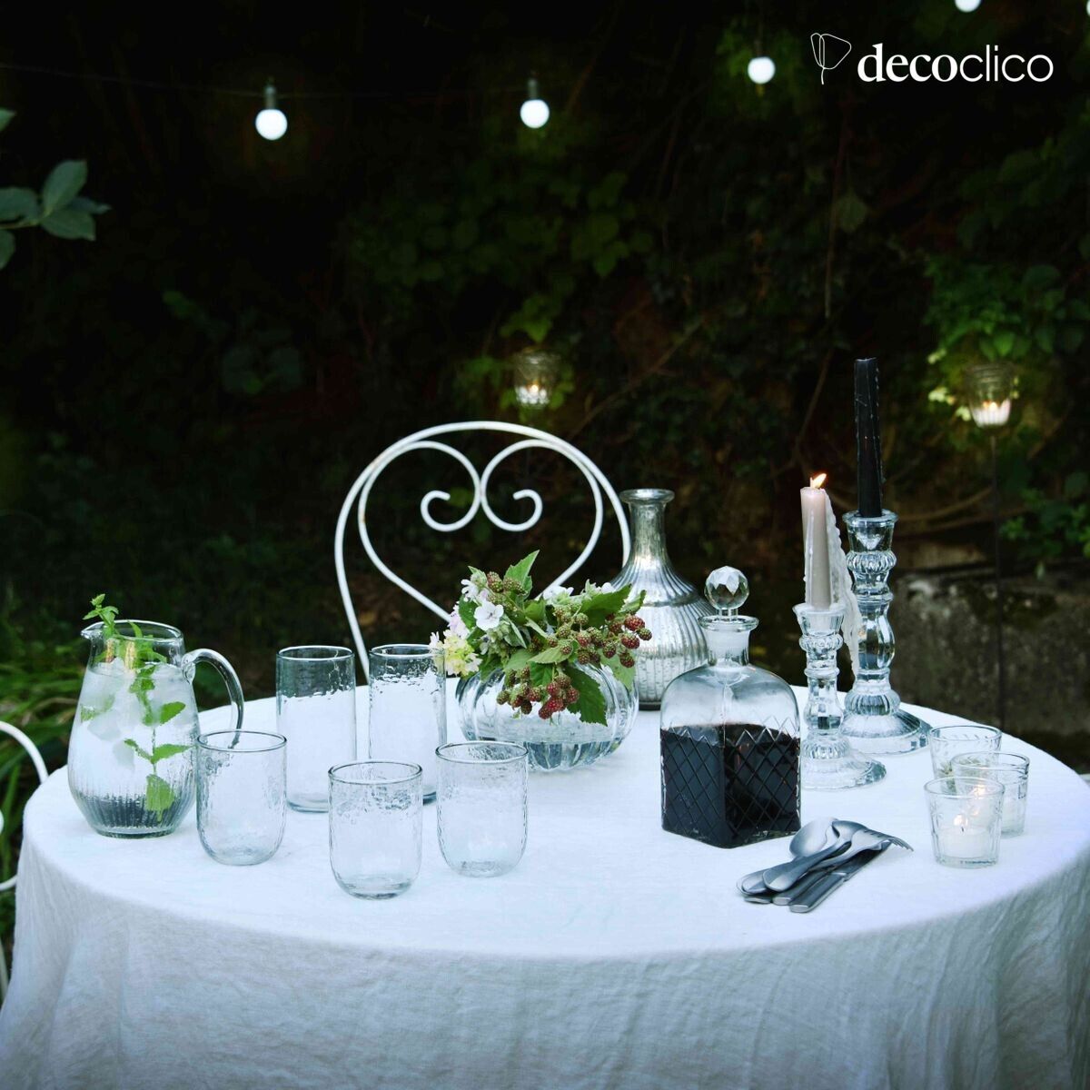 Jug carafe in transparent dappled glass with ribbed base