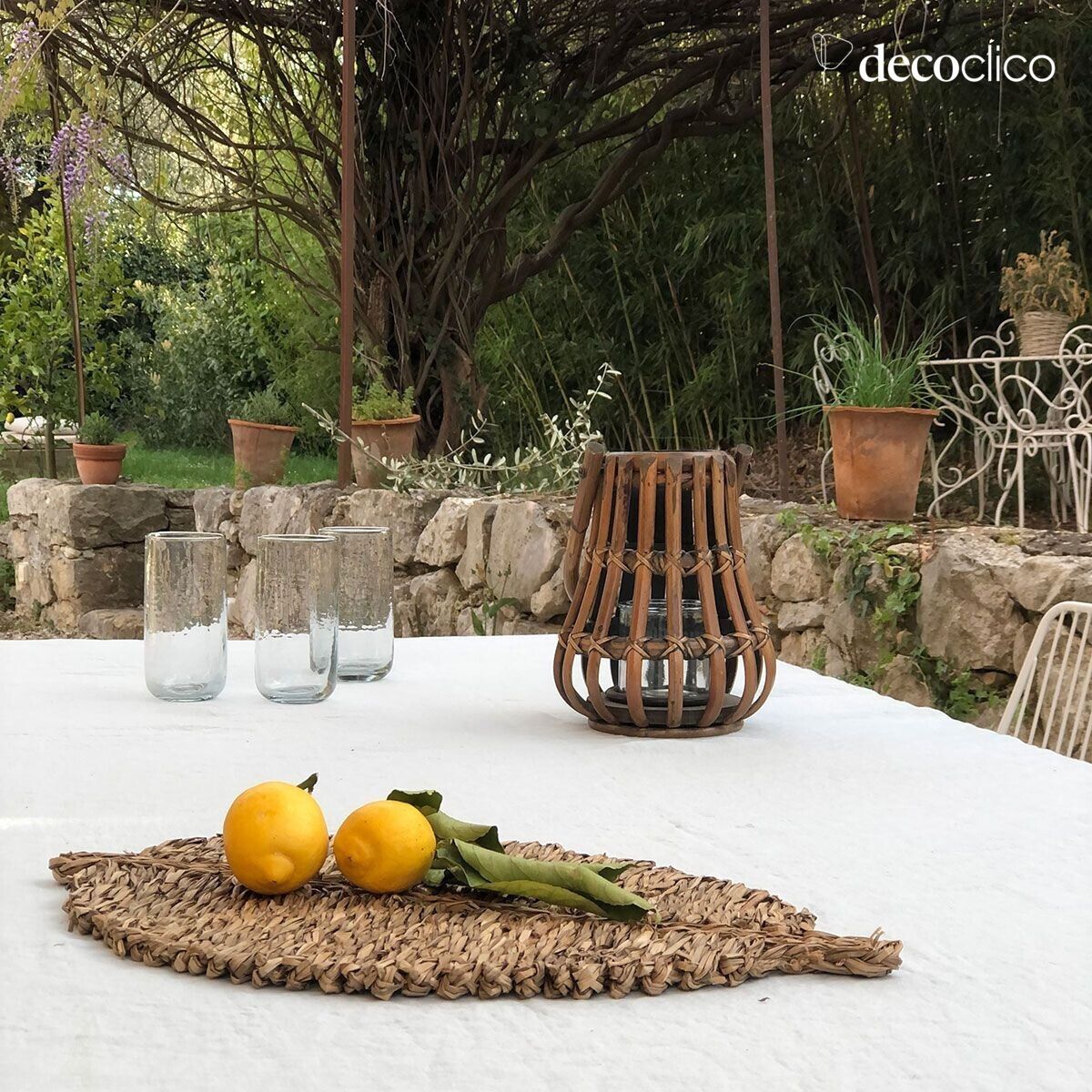 Lanterna portacandela in rattan con manico