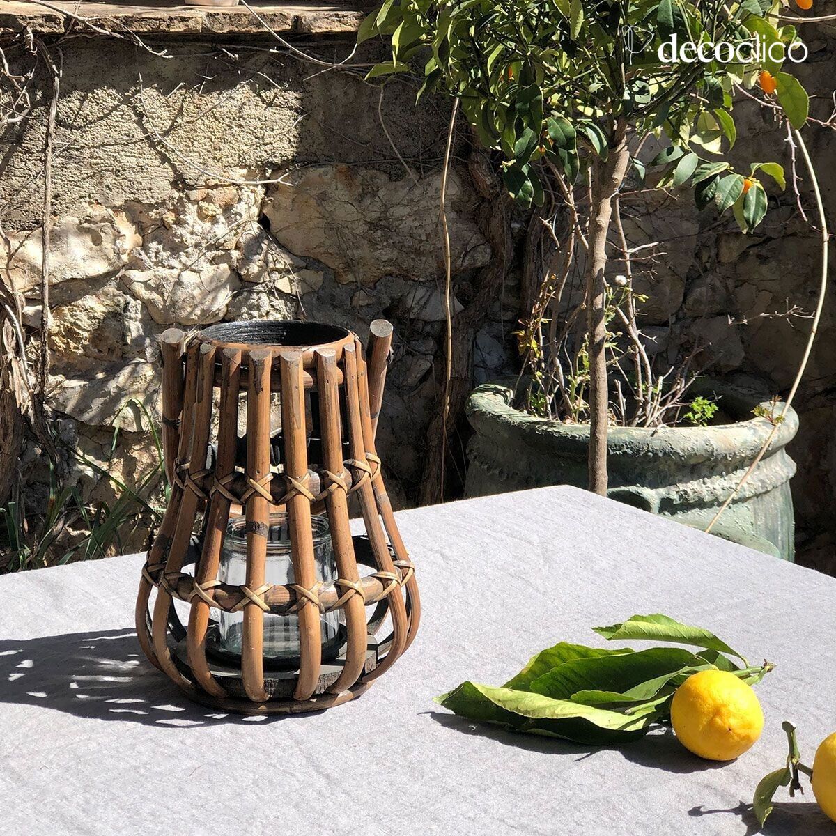 Lanterna portacandela in rattan con manico