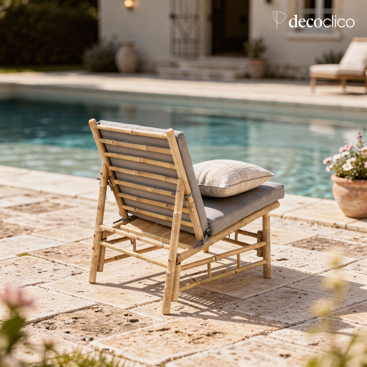 Low lounge chair in natural bamboo with gray outdoor cushion Taman