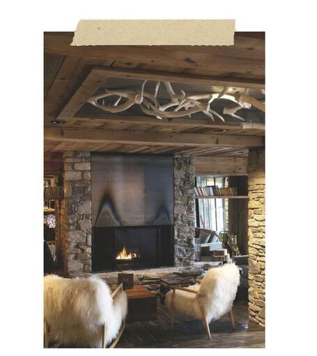 Photo : cheminée lobby hôtel Le M de Megeve | Decoclico