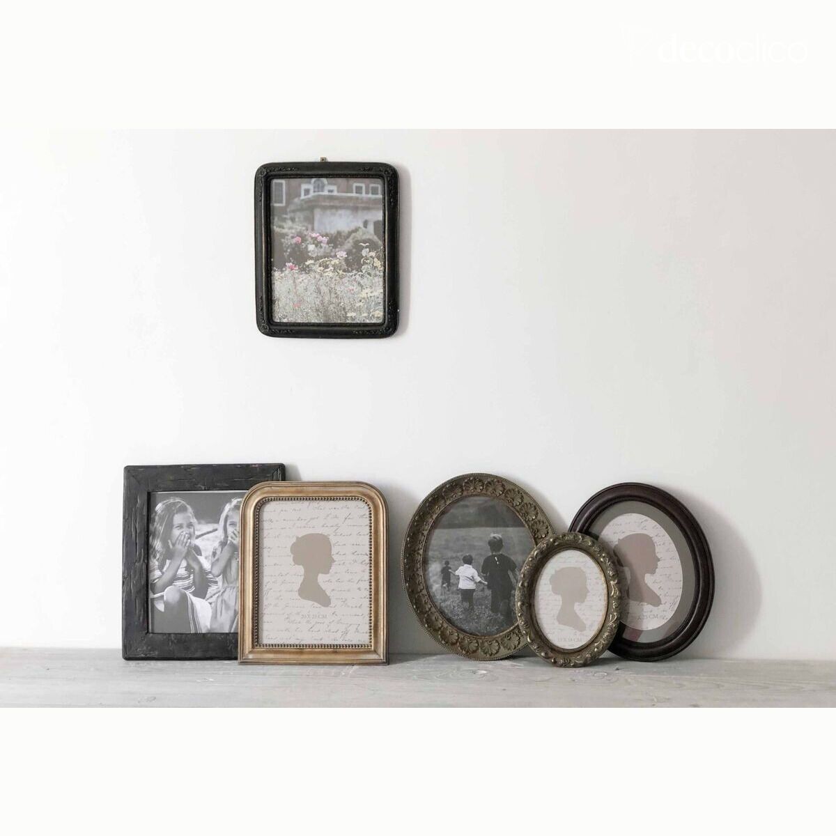 Rectangular matt black photo frame with a patinated garland relief 30 x 25 cm Man